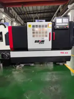 Used Baoji TK 40 CNC Lathe with Hydraulic Chuck photo 2