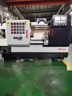 Used Baoji TK 40 CNC Lathe with Hydraulic Chuck photo 3