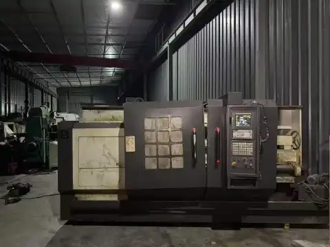 Torno CNC de servicio pesado CK 6183 x 1500 usado