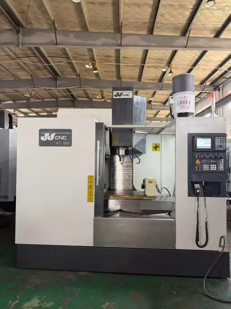 Used Shanghai Jiji CNC AT 850 Vertical Machining Center with 4 th Axis photo 1