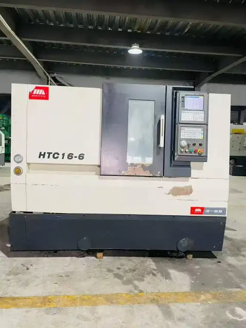 เครื่องกลึง CNC แบบป้อมมีด Shenyang HTC 16-6 มือสอง
