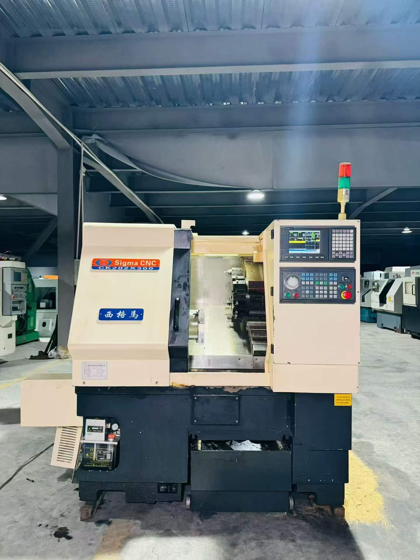 Used Xigema CK 202-300 Slant-Bed CNC Lathe photo 2