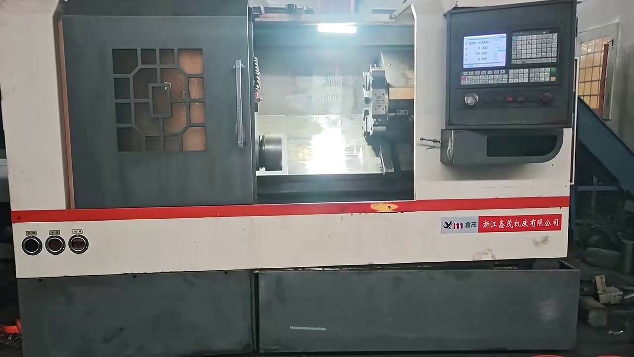 Used Xinmao 46 Slant-Bed Turret CNC Lathe with GSK 980 TDC photo 1