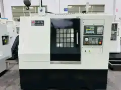 Used Guangdong Xuyang 46 D Slant-Bed Turret-Type CNC Lathe photo 1