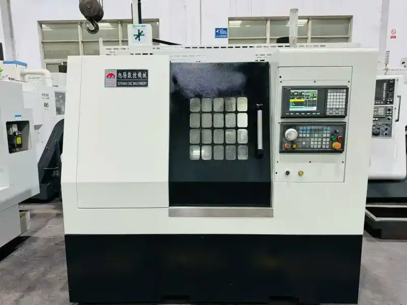 Used Guangdong Xuyang 46 D Slant-Bed Turret-Type CNC Lathe photo 1