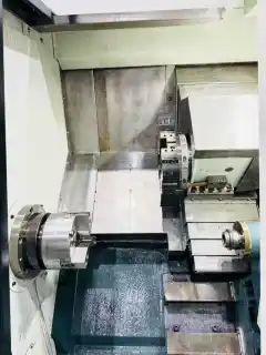 Used Guangdong Xuyang 46 D Slant-Bed Turret-Type CNC Lathe photo 3
