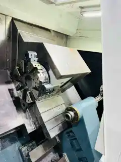 Used Guangdong Xuyang 46 D Slant-Bed Turret-Type CNC Lathe photo 4