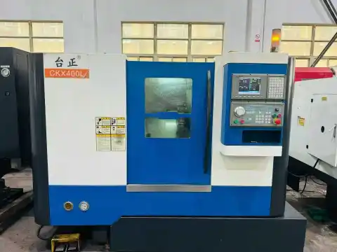 เครื่องกลึง CNC แบบ turret Taizheng CKX 400 L มือสอง