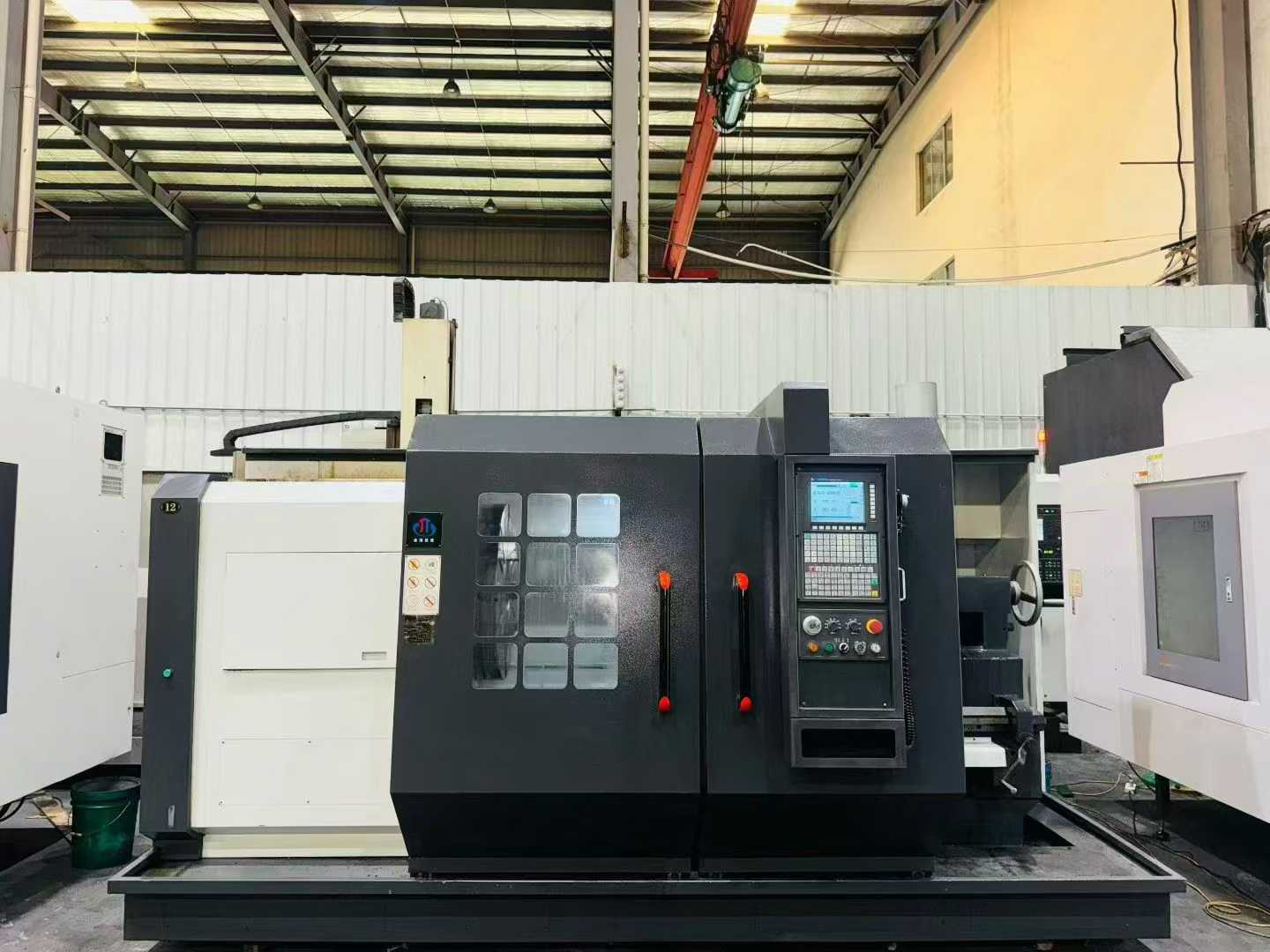 Used Zhejiang Jintang 61100/1500 CNC Lathe – 90% New photo 1