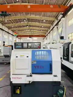 Used Zhejiang Xiaoxuanfeng YT 25 Gang-Type CNC Lathe photo 1