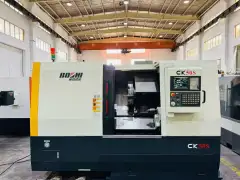 Used Baoji CK 50 S Turret-Type CNC Lathe with KND K 2000 photo 2