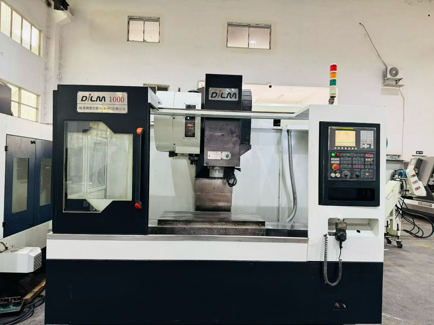 Used Dileimu 1060 Vertical Machining Center with Fanuc TD Control photo 2