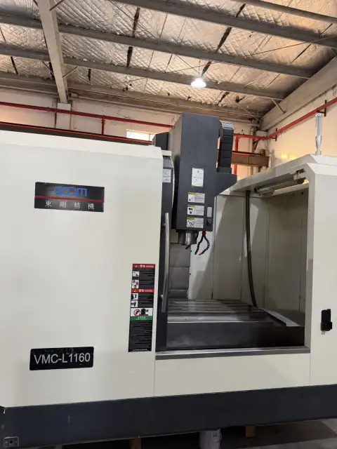 Centro de mecanizado Donggang Precision Machinery 1160 con Mitsubishi M 70