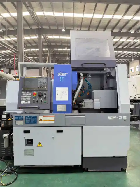 مخرطة CNC سويسرية STAR SP-23 بخمسة محاور مستعملة مع FANUC TF-Plus