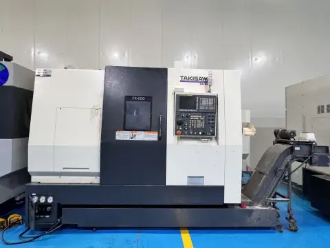 Torno CNC de torneado-fresado Takisawa FX-600 usado con doble husillo y doble torreta