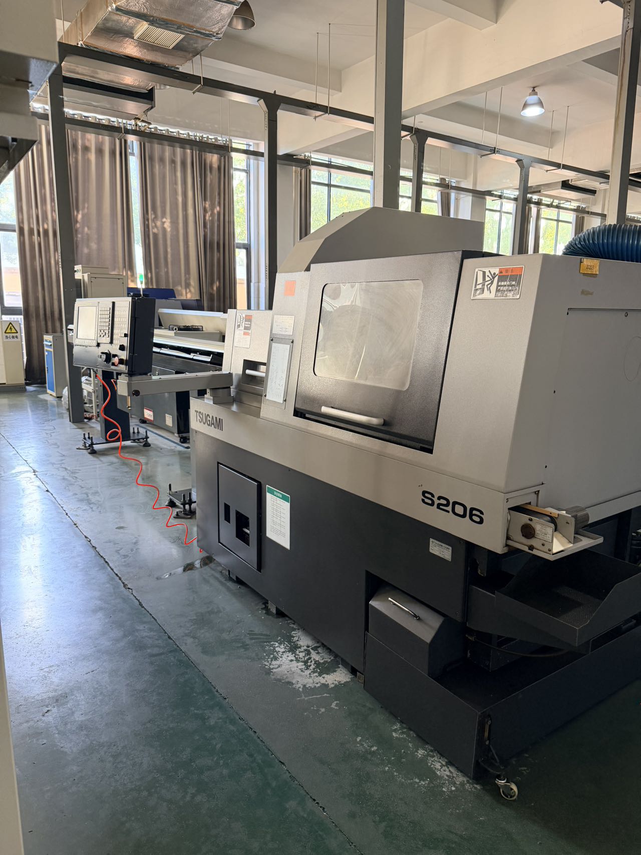 Used Tsugami S 206 CNC Lathe with FANUC 32 i System photo 1