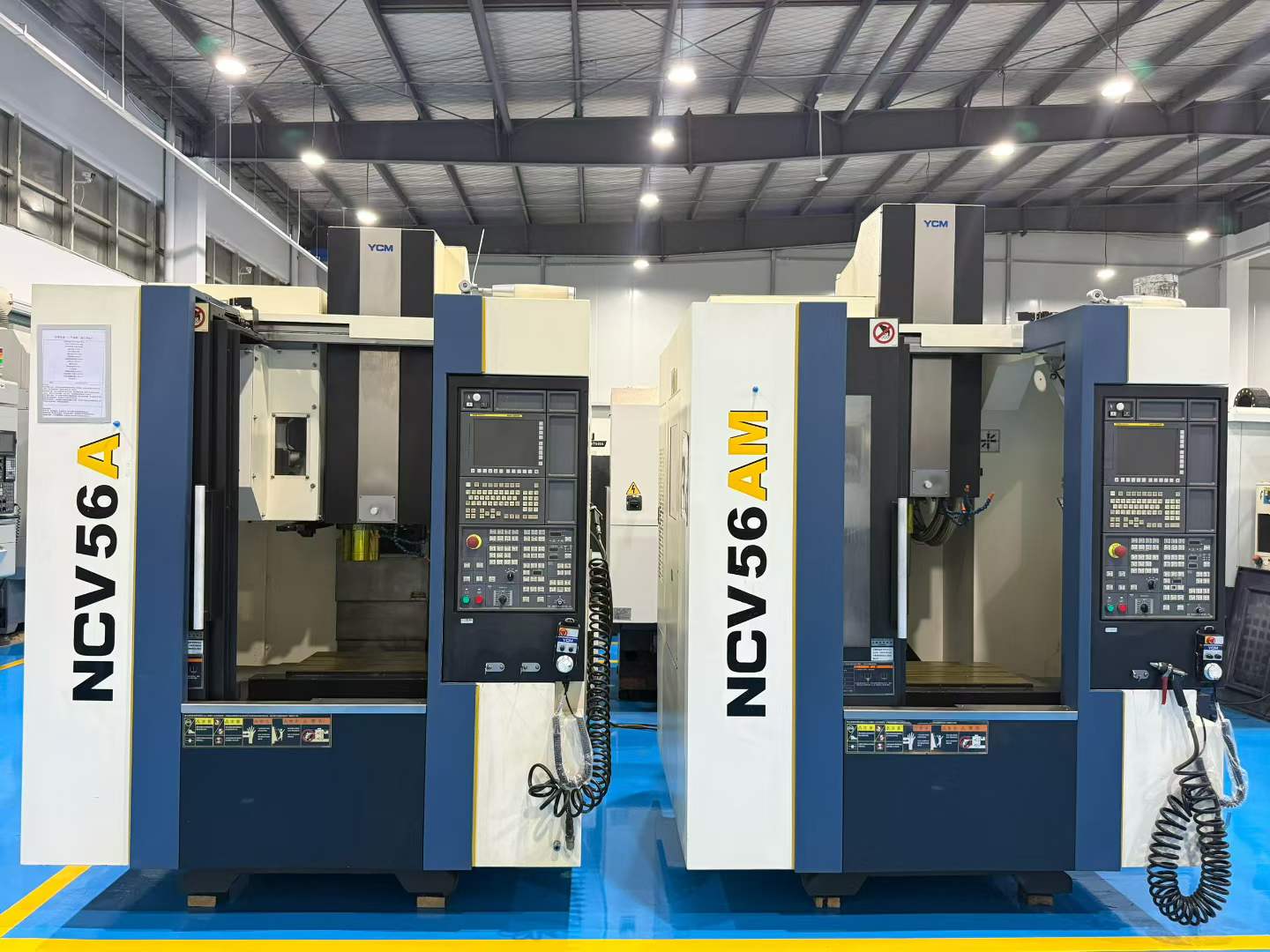 ศูนย์แมชชีนนิ่งเซ็นเตอร์ YCM NCV 56 AM มือสอง พร้อม FANUC MXP 200 FA