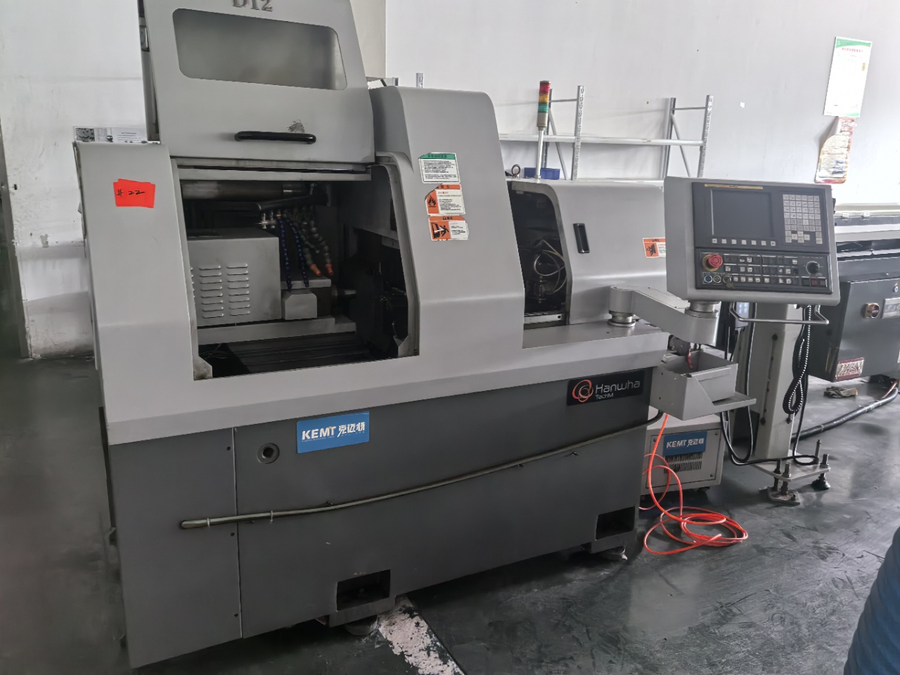 Used Hanwha XD 12 H 5-Axis Swiss-Type CNC Lathe photo 1