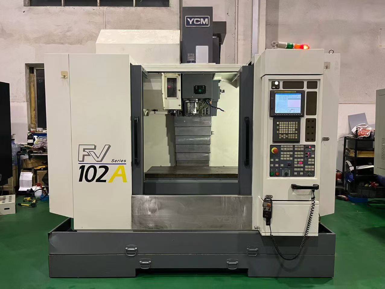 Used YCM FV-102 A Machining Center with Fanuc MXP-200 i photo 1