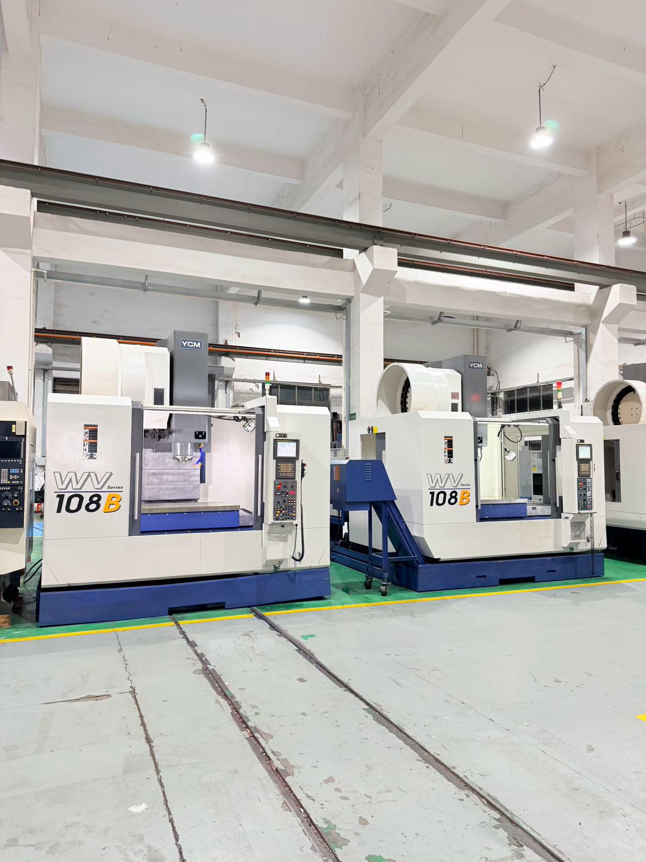 Two Used YCM WV 108 B Machining Centers with Fanuc 200 i Control