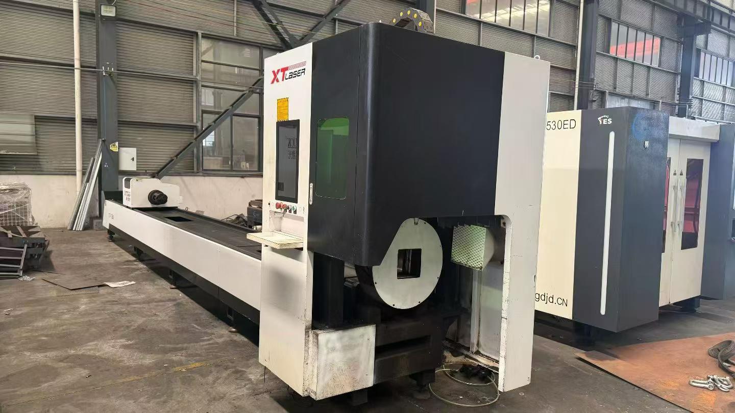 Máquina cortadora láser de tubos Xintian Laser 6016 usada, 1500 W con control Weihong