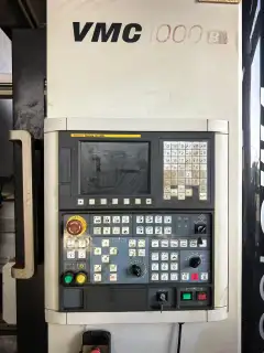 Used 1060 Machining Center with FANUC MD Control and 4 th Axis photo 2