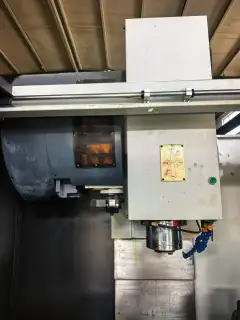 Used 1060 Machining Center with FANUC MD Control and 4 th Axis photo 3