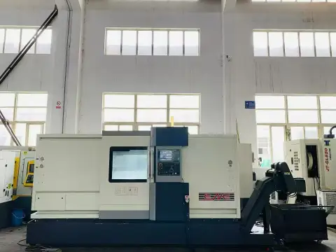 مخرطة CNC بسرير مائل وبرج أدوات، للخدمة الشاقة، مستعملة Dalian DL-25 M/1000 مع FANUC