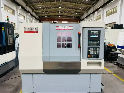 Torno CNC JP 46 usado de bancada inclinada tipo gang