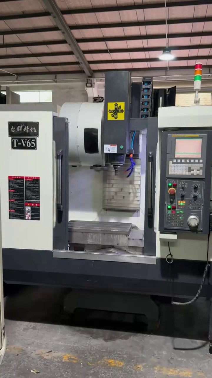 Used Taikan V 65 Vertical Machining Center with FANUC 0i-MD photo 1
