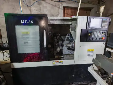 เครื่องกลึง CNC มือสองพร้อมสปินเดิลคู่ตรงข้ามและระบบควบคุม SYNTEC 22