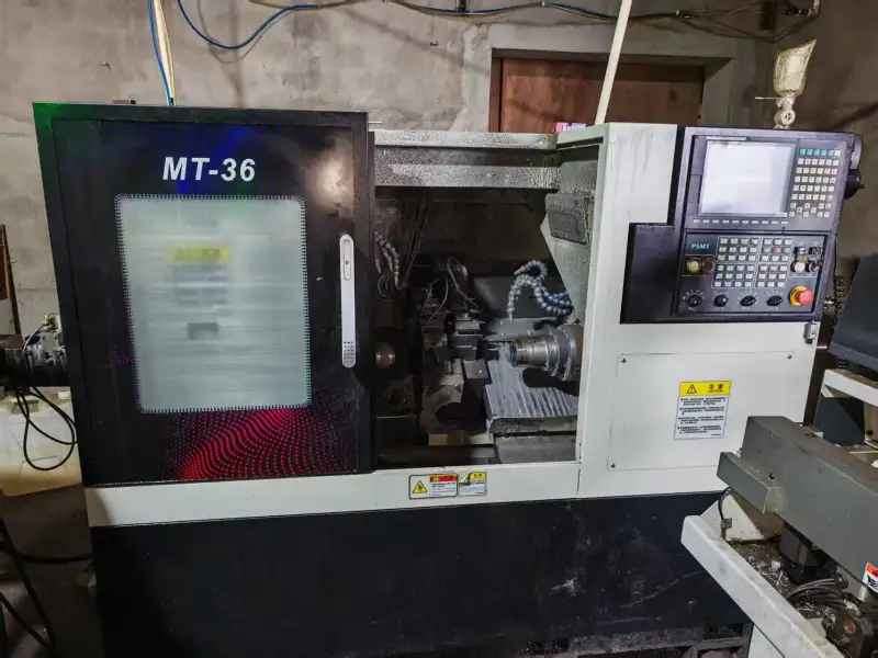 Used CNC Lathe with Dual Opposed Spindles and SYNTEC 22 Control photo 1