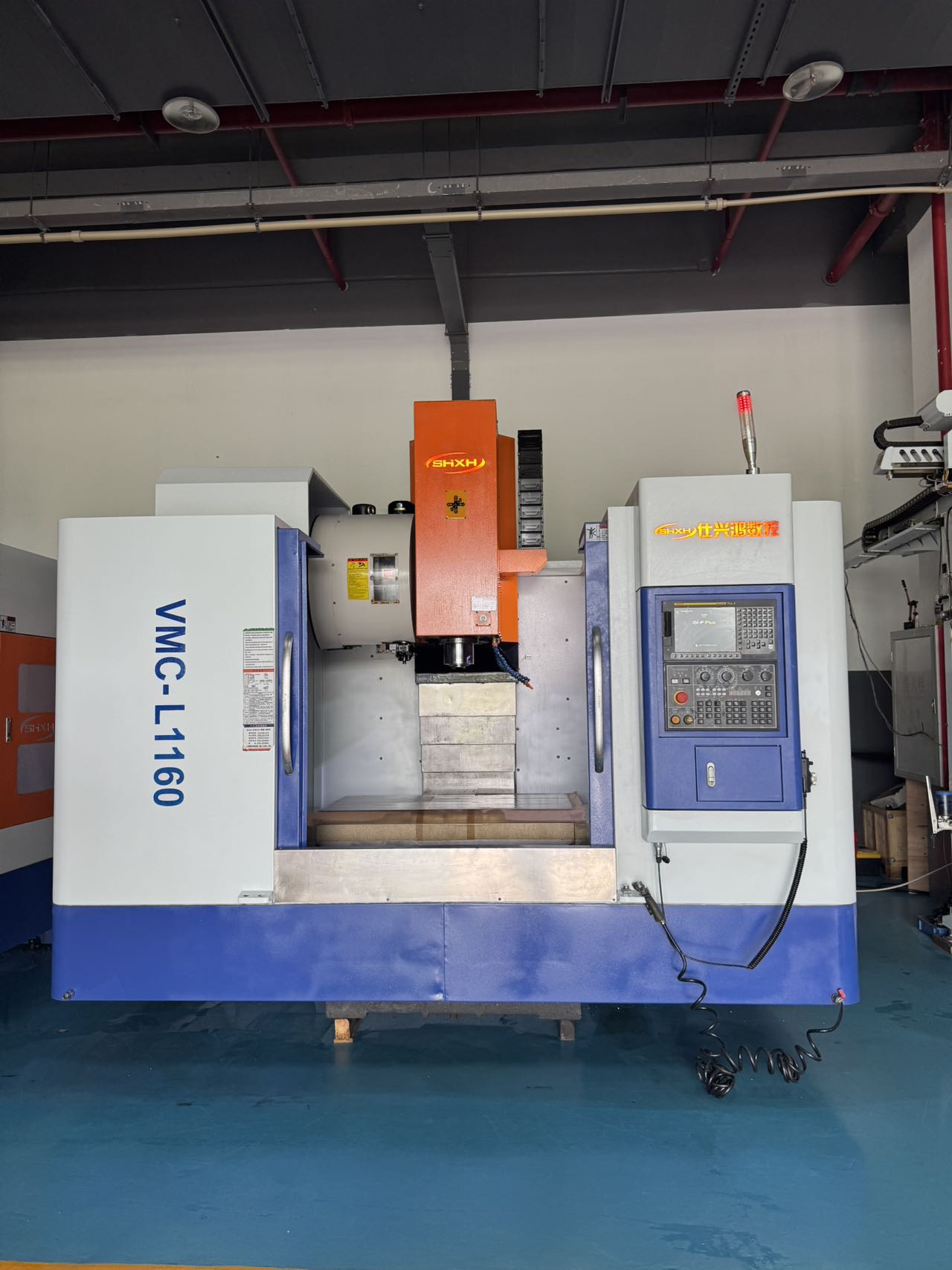 ศูนย์แมชชีนนิ่งเซ็นเตอร์แนวตั้ง Shi Xing Hong 1160 มือสอง พร้อม FANUC Plus