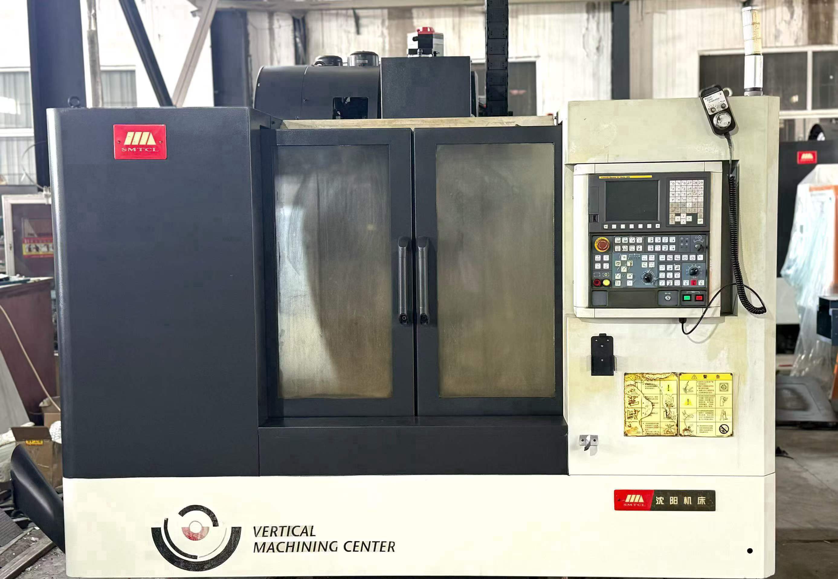 Two Used Shenyang 850 Vertical Machining Centers with FANUC MD Control photo 2