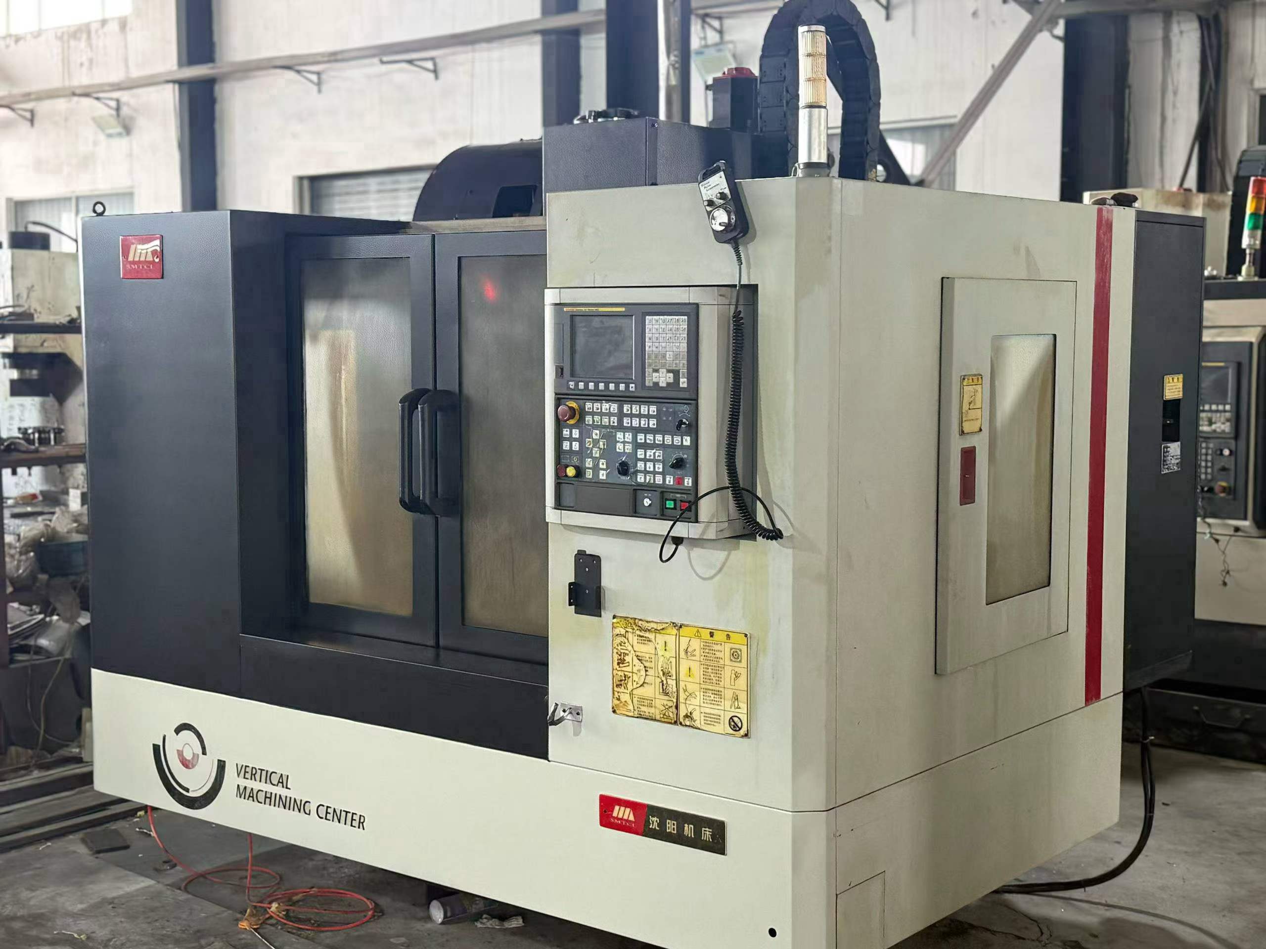Two Used Shenyang 850 Vertical Machining Centers with FANUC MD Control photo 3
