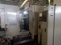 Used Dual-Station Machining Center with FANUC 18 i-MB Control and BT50 Spindle photo 2
