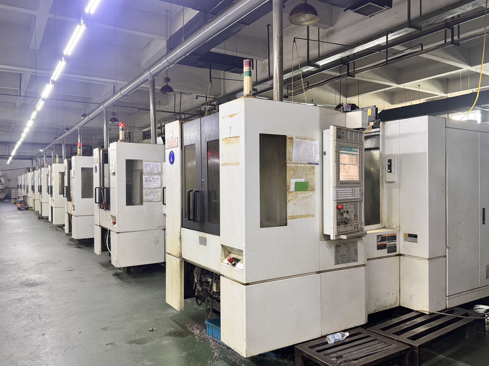 Centro de mecanizado horizontal de doble estación Mori Seiki NH 4000 DCG usado con FANUC 31 i