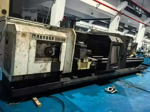 เครื่องกลึง CNC Dandong Huajun 6180-5 m มือสอง ระบบควบคุม GSK