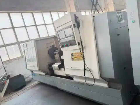 مخرطة CNC مستعملة Yunnan Lianji 6180/1.5 م مع سكة توجيه 600 – عدد 2