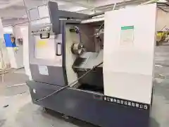 Used Zhejiang Jingdian 32 Turret-Type CNC Lathe with 8-Inch Chuck photo 1