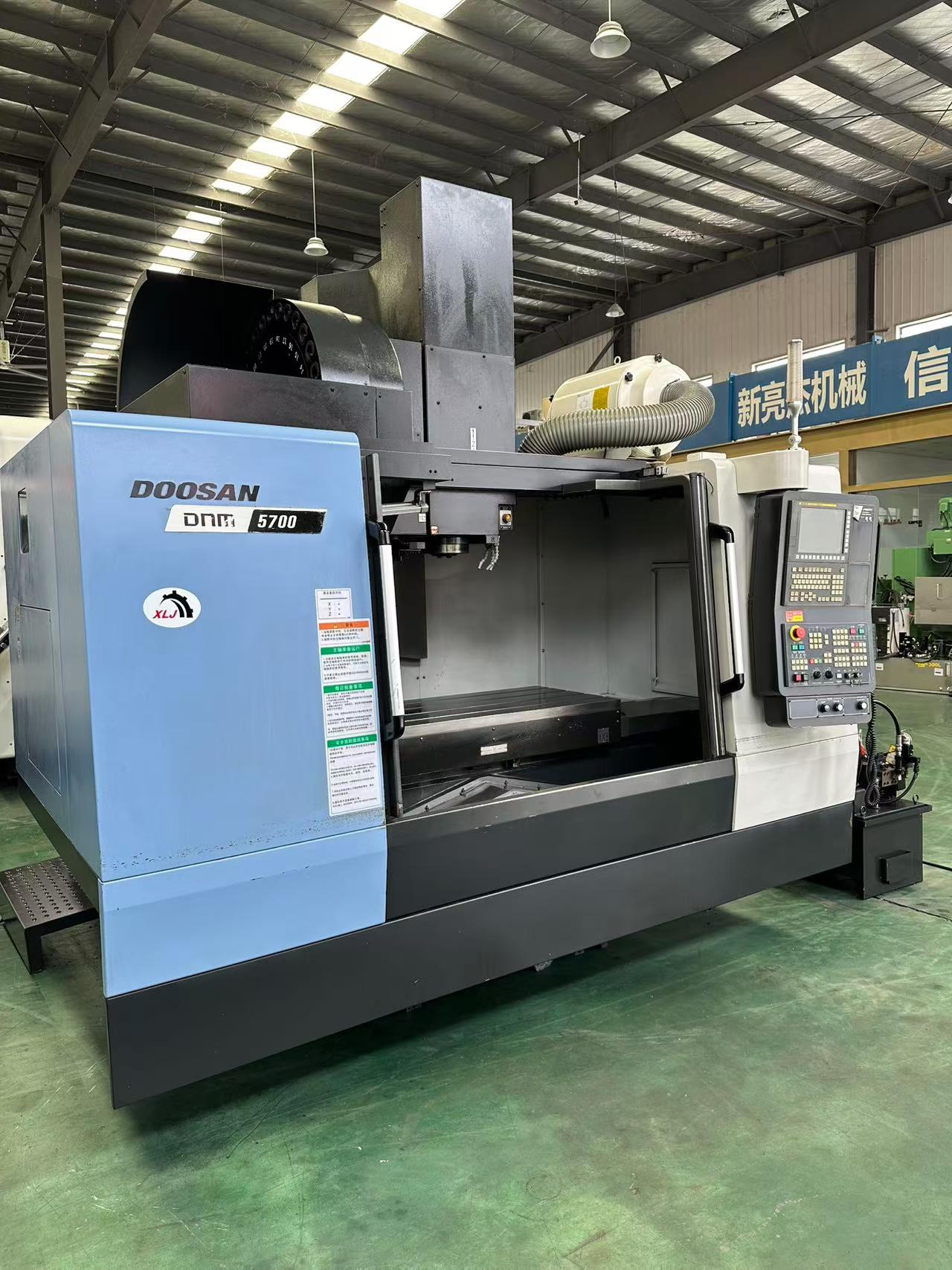 Used DN Solutions DNM 5700 Machining Center with FANUC i Series