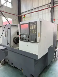 Used Okuma L 400 CNC Lathe photo 9