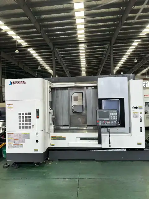 Torno CNC Okuma U 3000 de 5 ejes para torneado y fresado, usado, con control OSP-P 300 SA-H