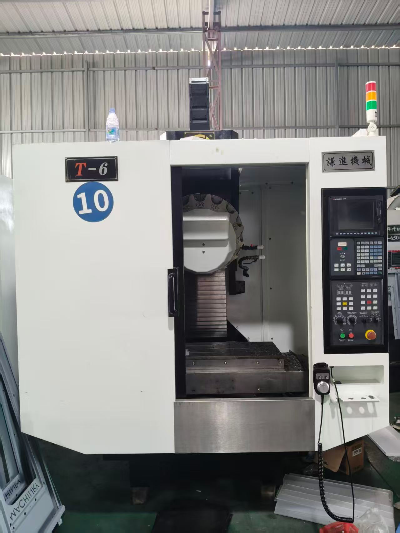 เครื่องเจาะและต๊าปเกลียว Qianjin T 600 มือสอง พร้อมระบบควบคุม Mitsubishi M 70