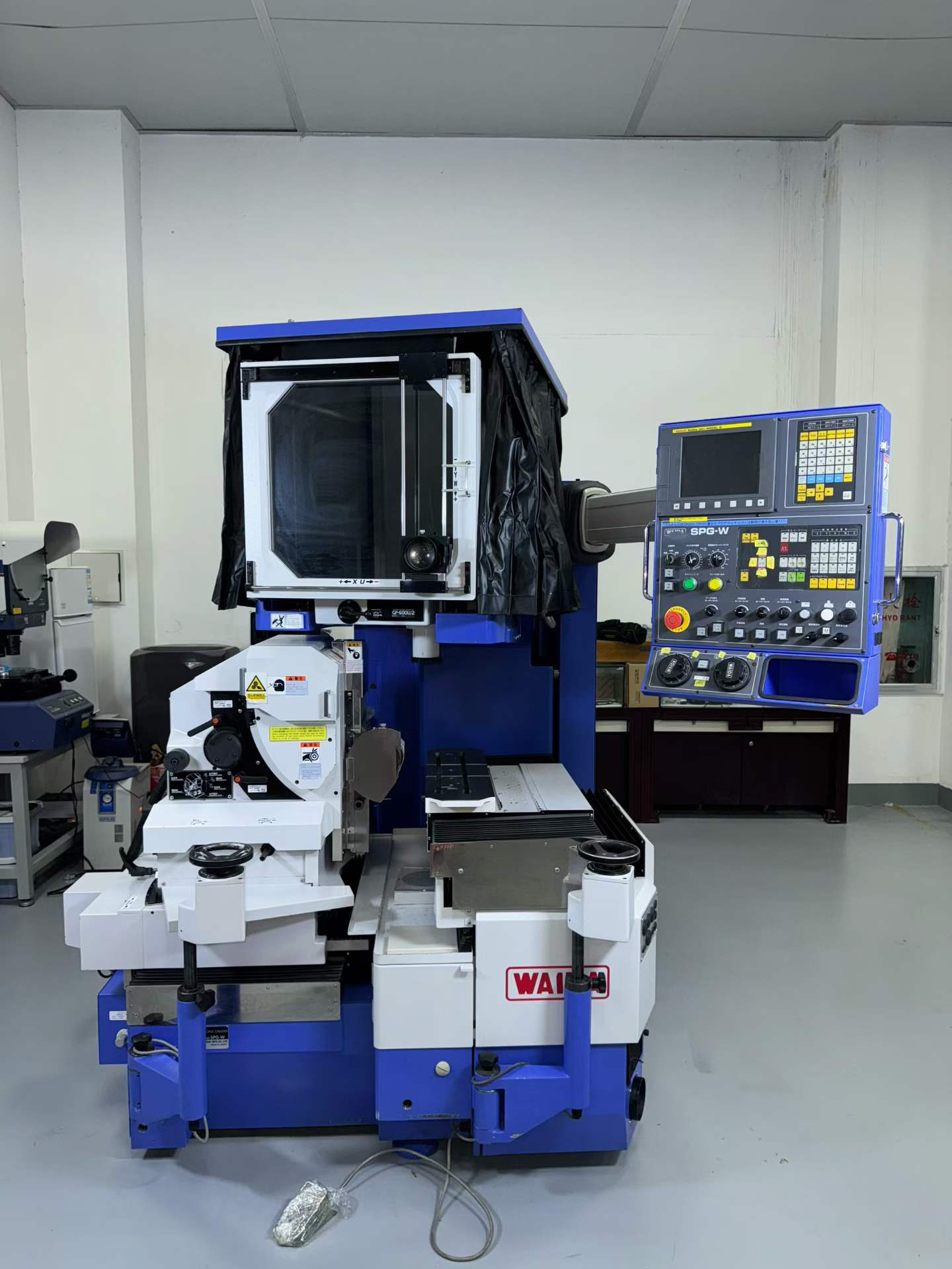 Used WAIDA SPG-W CNC Optical Profile Grinder photo 2