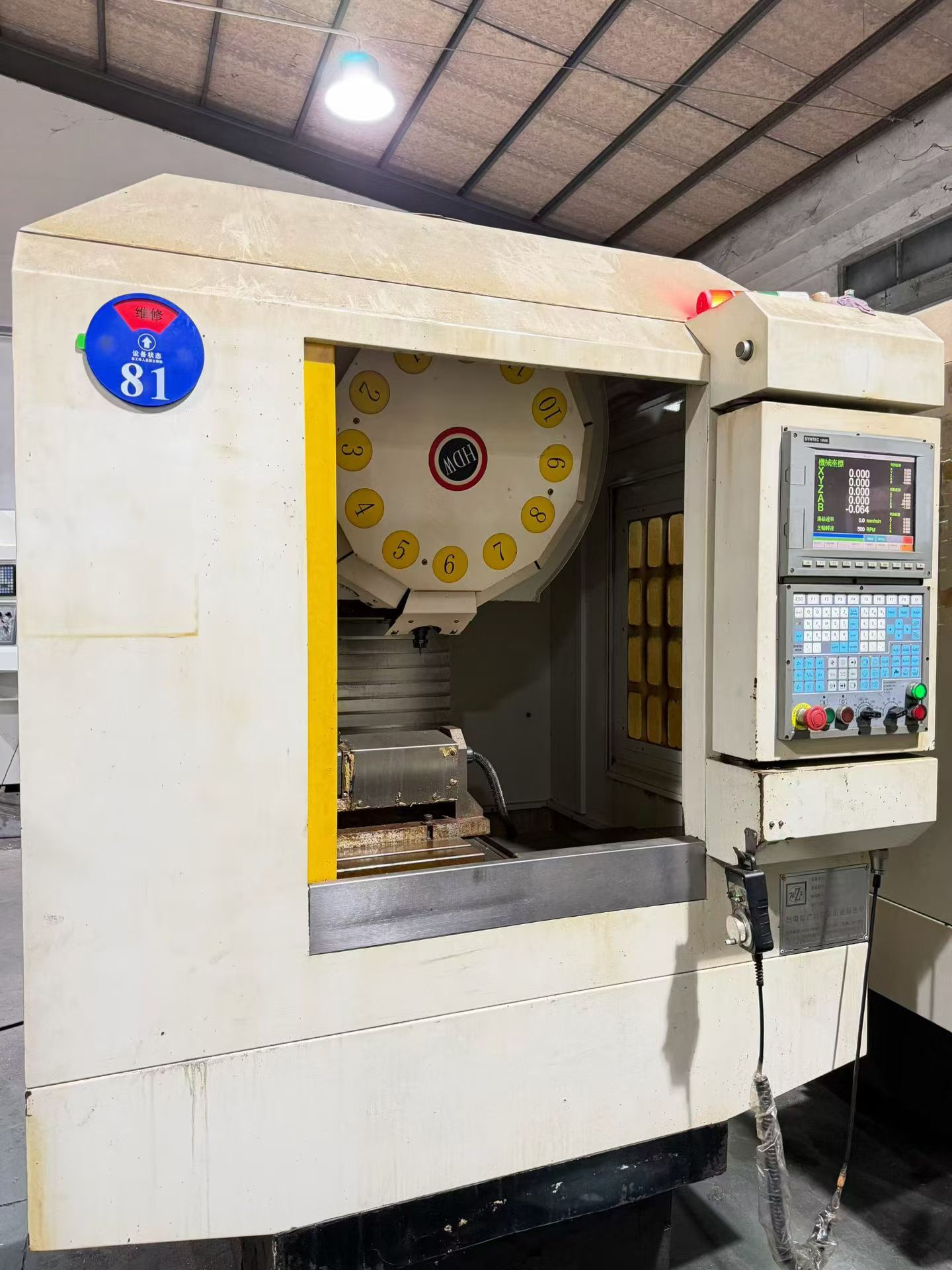 Used Shenzhen Guanglijin T 5 CNC Machine with SYNTEC Control and 12-Tool Magazine photo 1