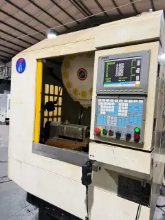 Used Shenzhen Guanglijin T 5 CNC Machine with SYNTEC Control and 12-Tool Magazine photo 2