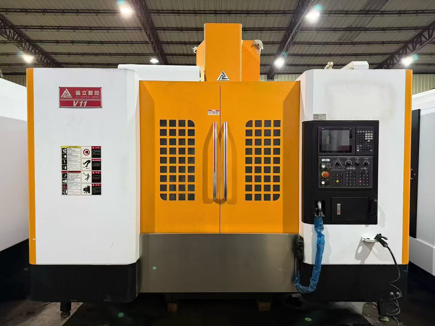Used Xieli V 11 Vertical Machining Center with Mitsubishi M 80 photo 2
