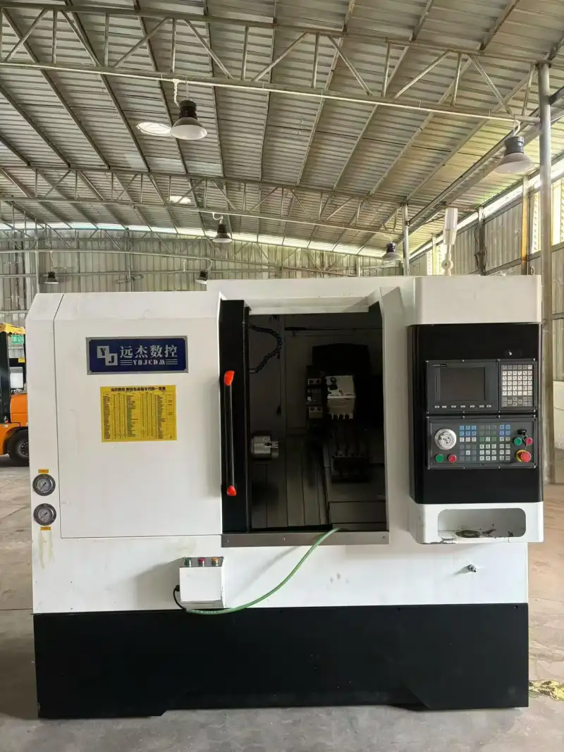 Two Nearly New Yuanjie 46 Turret-Type CNC Lathes with SYNTEC photo 1