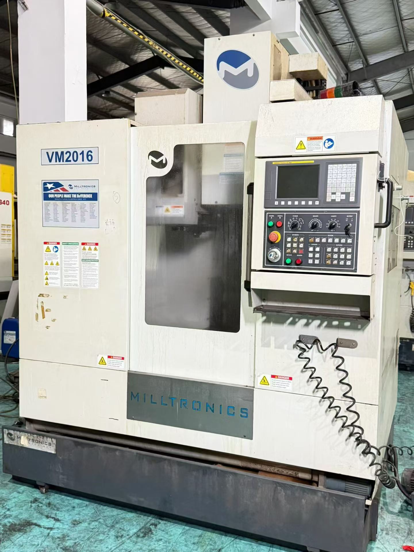 Used Milltronics VM 2016 Machining Center with FANUC MD photo 2